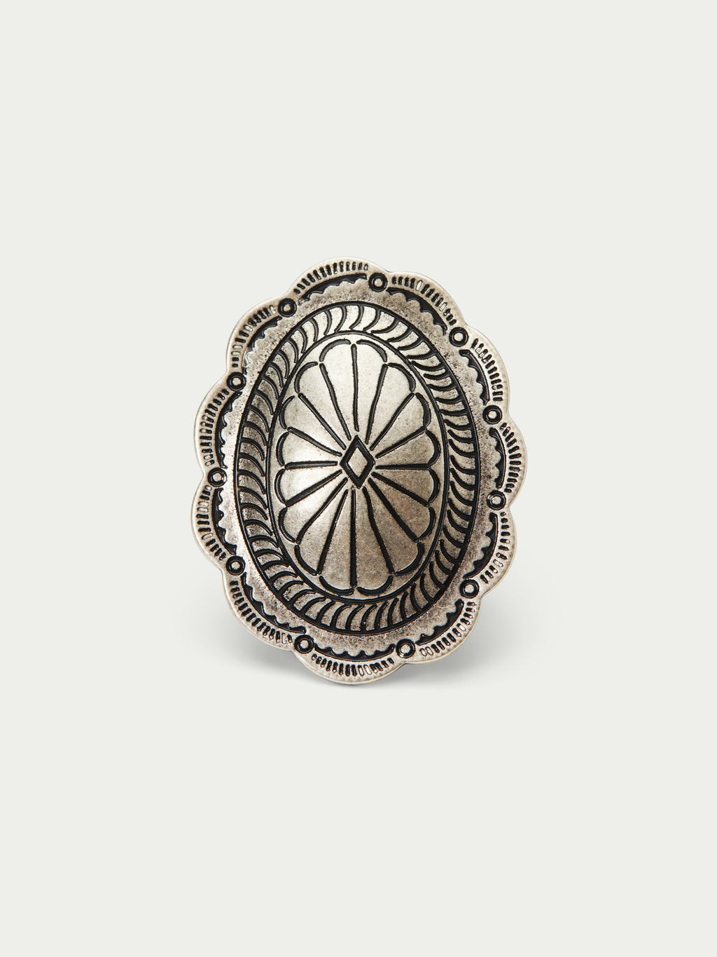 Antiqued silver concho scarf slide with etched medallion pattern and scalloped rim