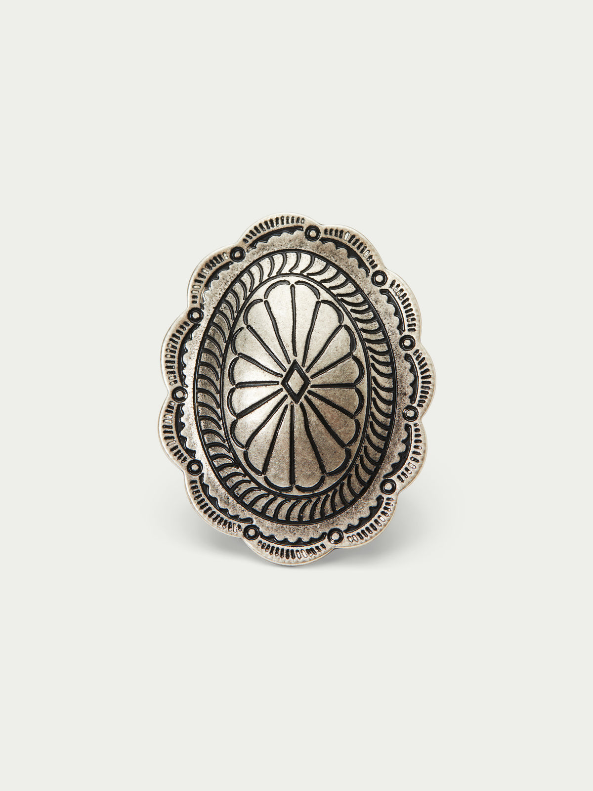 Antiqued silver concho scarf slide with etched medallion pattern and scalloped rim