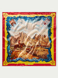 Wild rag scarf square with red-yellow-blue border and desert mountain scene