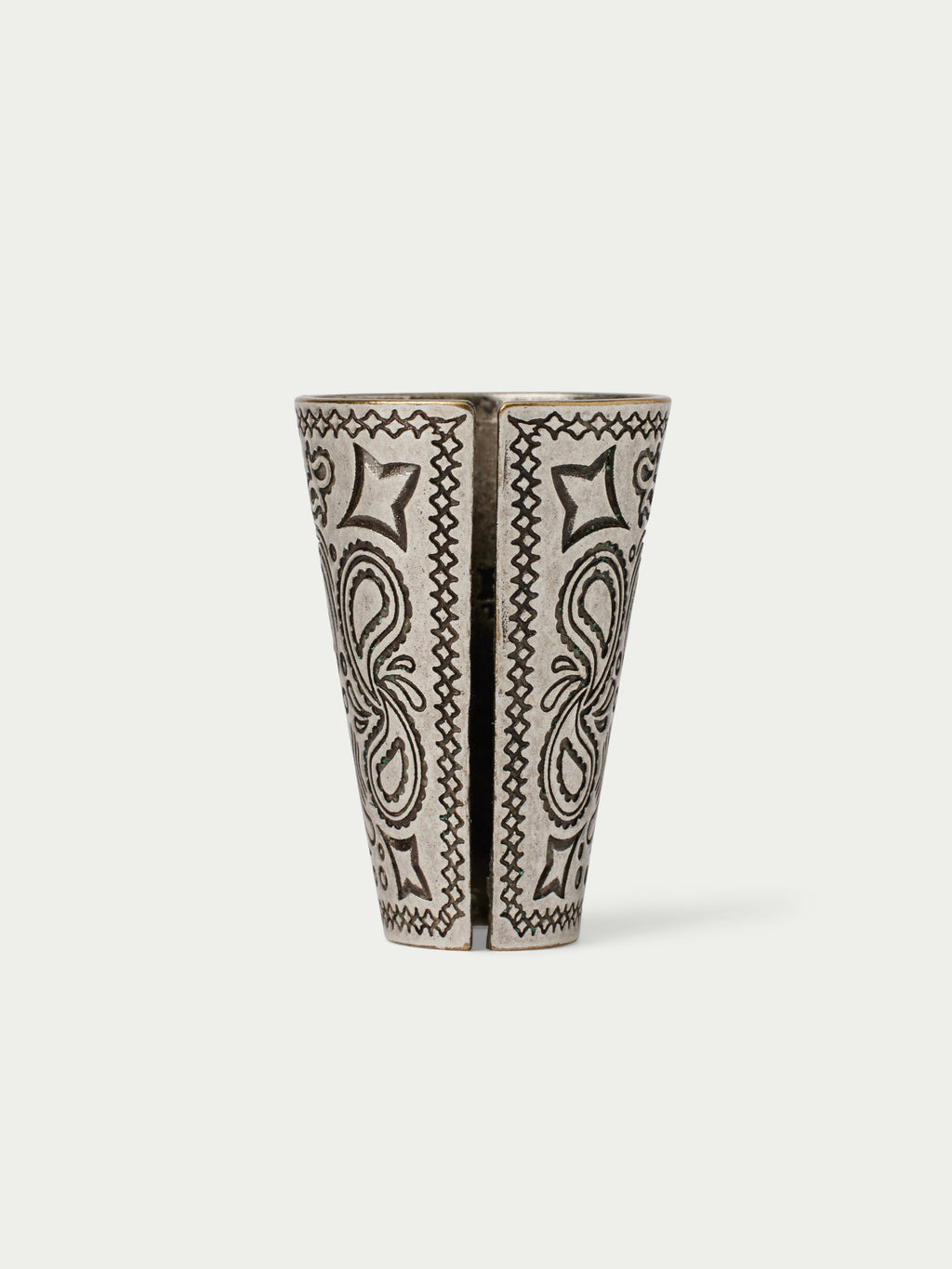 Paisley-patterned cone cup with two vertical motif panels in black on a cream base