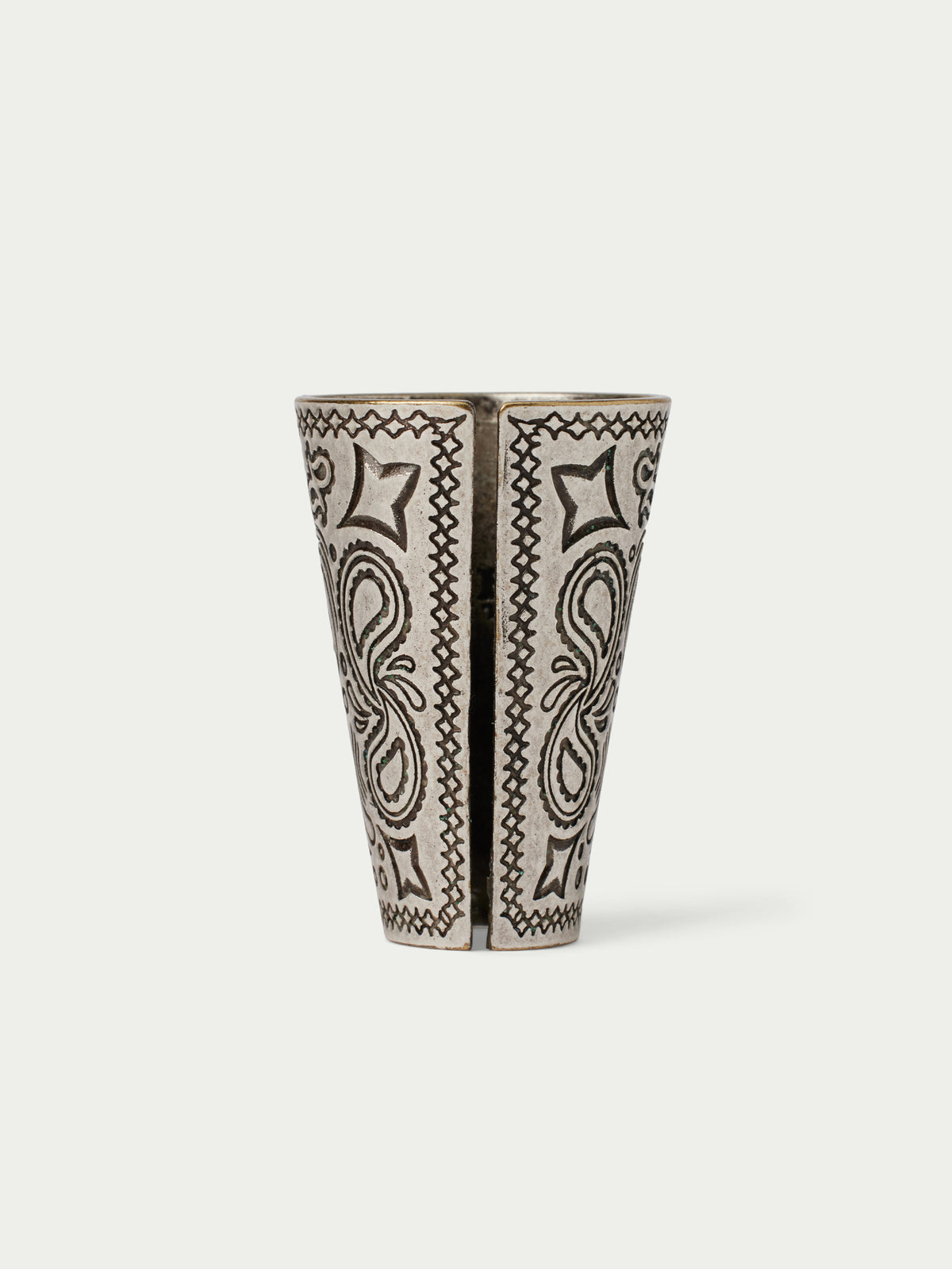Paisley-patterned cone cup with two vertical motif panels in black on a cream base