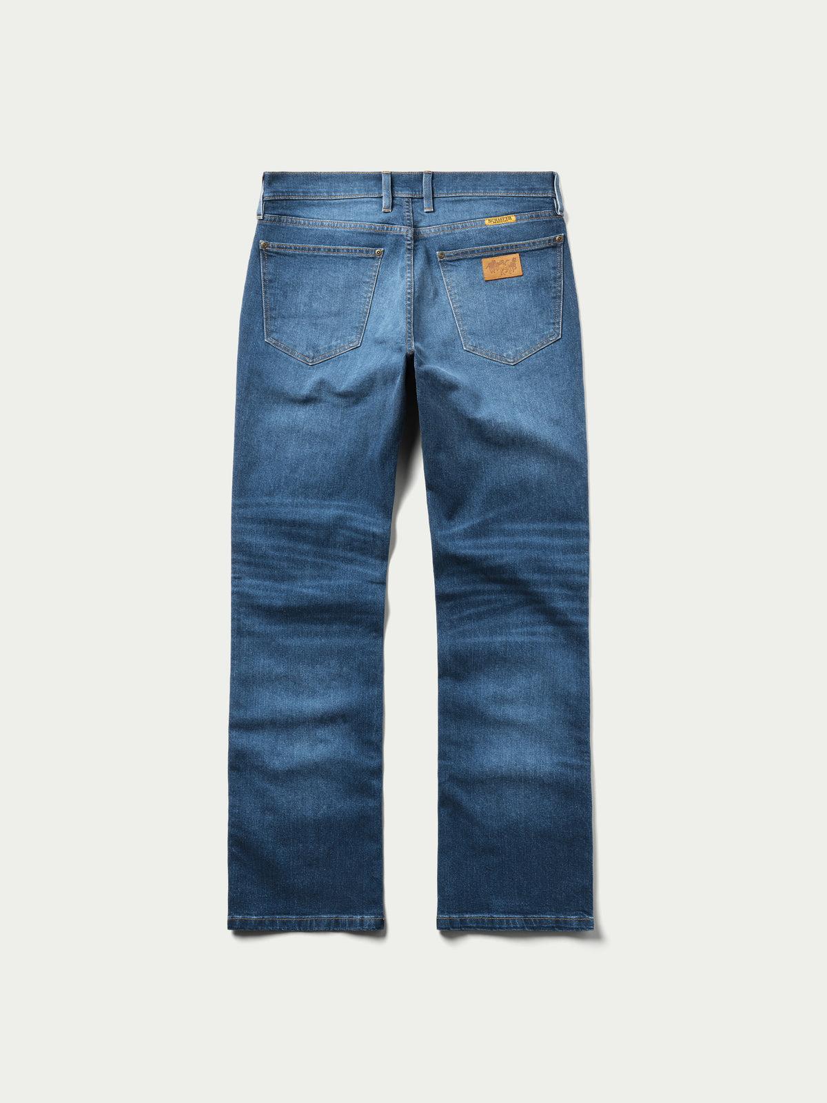 Blue boot-cut denim dungarees with front pockets and belt loops
