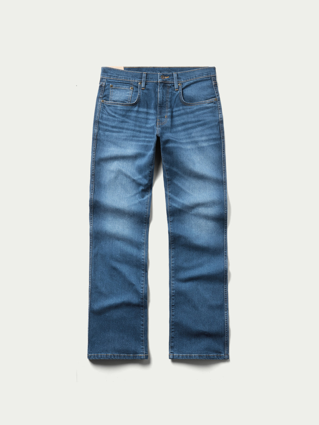 Washed blue boot-cut denim dungarees with belt loops and button closure