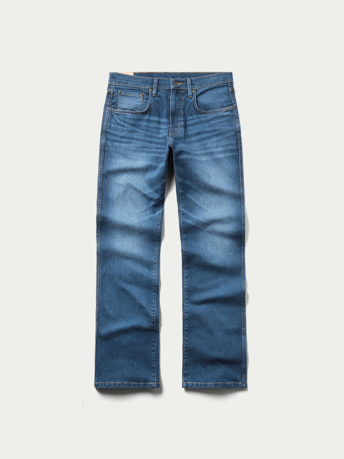 Washed blue boot-cut denim dungarees with belt loops and button closure