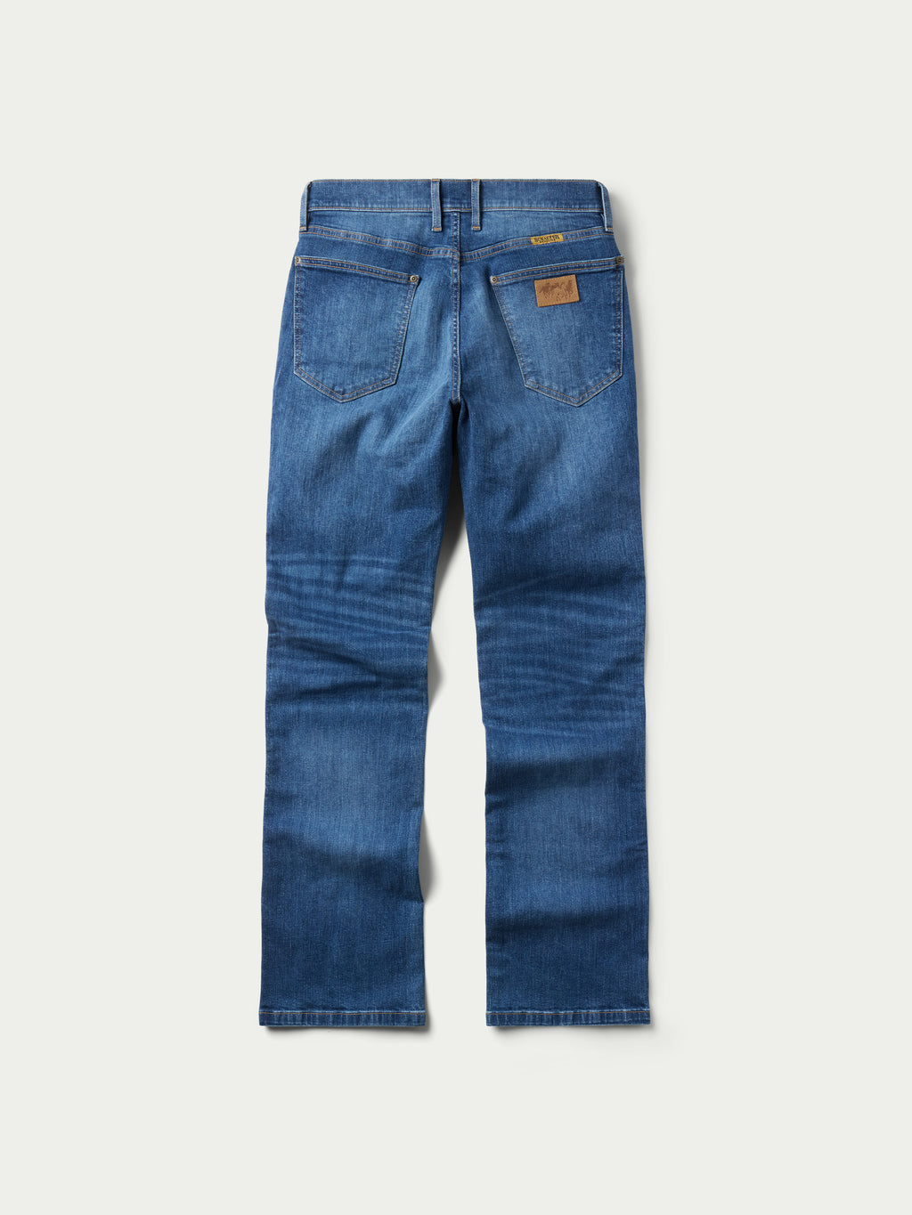 Medium-wash boot-cut dungaree jeans, flat-lay front with belt loops and pockets