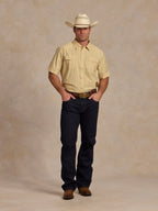 Short sleeve pearl snap western shirt, light cream patterned; full view being worn.