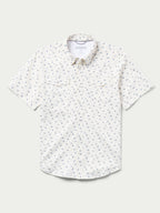 Short-sleeve pearl snap shirt in white with small blue floral pattern, chest pockets.