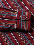 Striped button cuff and shoulder yoke with dark buttons on red multicolor shirt