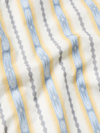 Light blue and white vertical stripe fabric for a cotton snap shirt