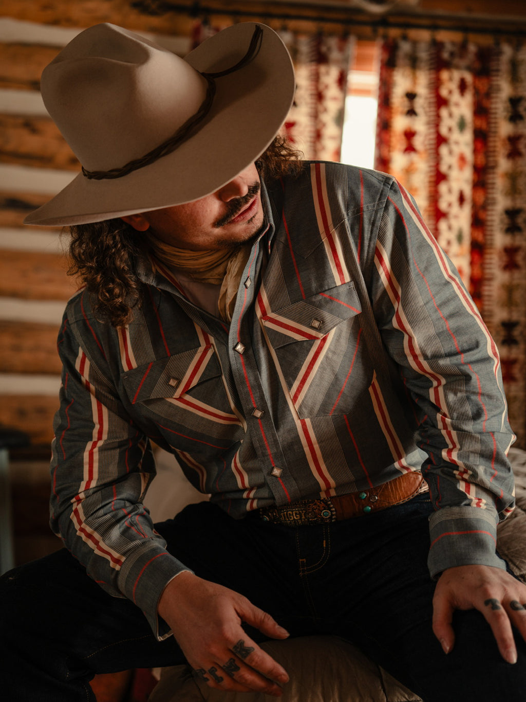 Western snap shirt in light blue with red and white vertical stripe pattern