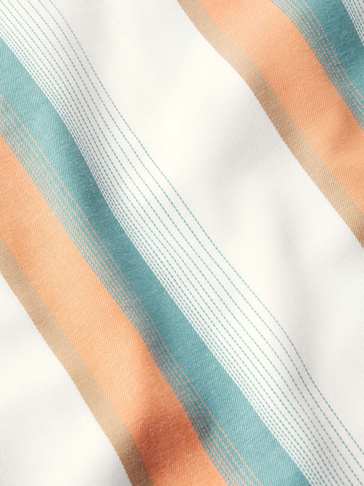 Western snap shirt fabric close-up with orange and teal vertical stripe pattern on white