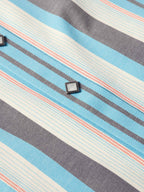 Light blue striped western snap shirt chest detail featuring metal-look snap hardware