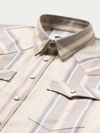 Western snap shirt in tan with blue and red stripes, button front and collar detail