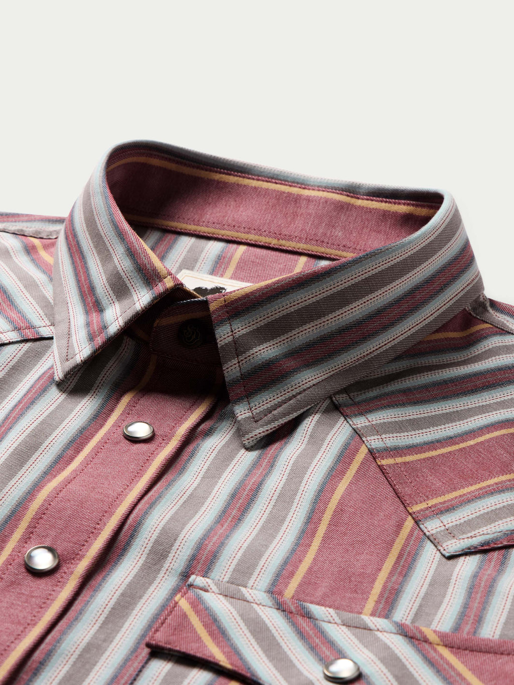 Western snap shirt collar and placket with striped trim and silver snaps