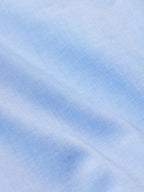 Light blue pinpoint dress shirt fabric texture close-up