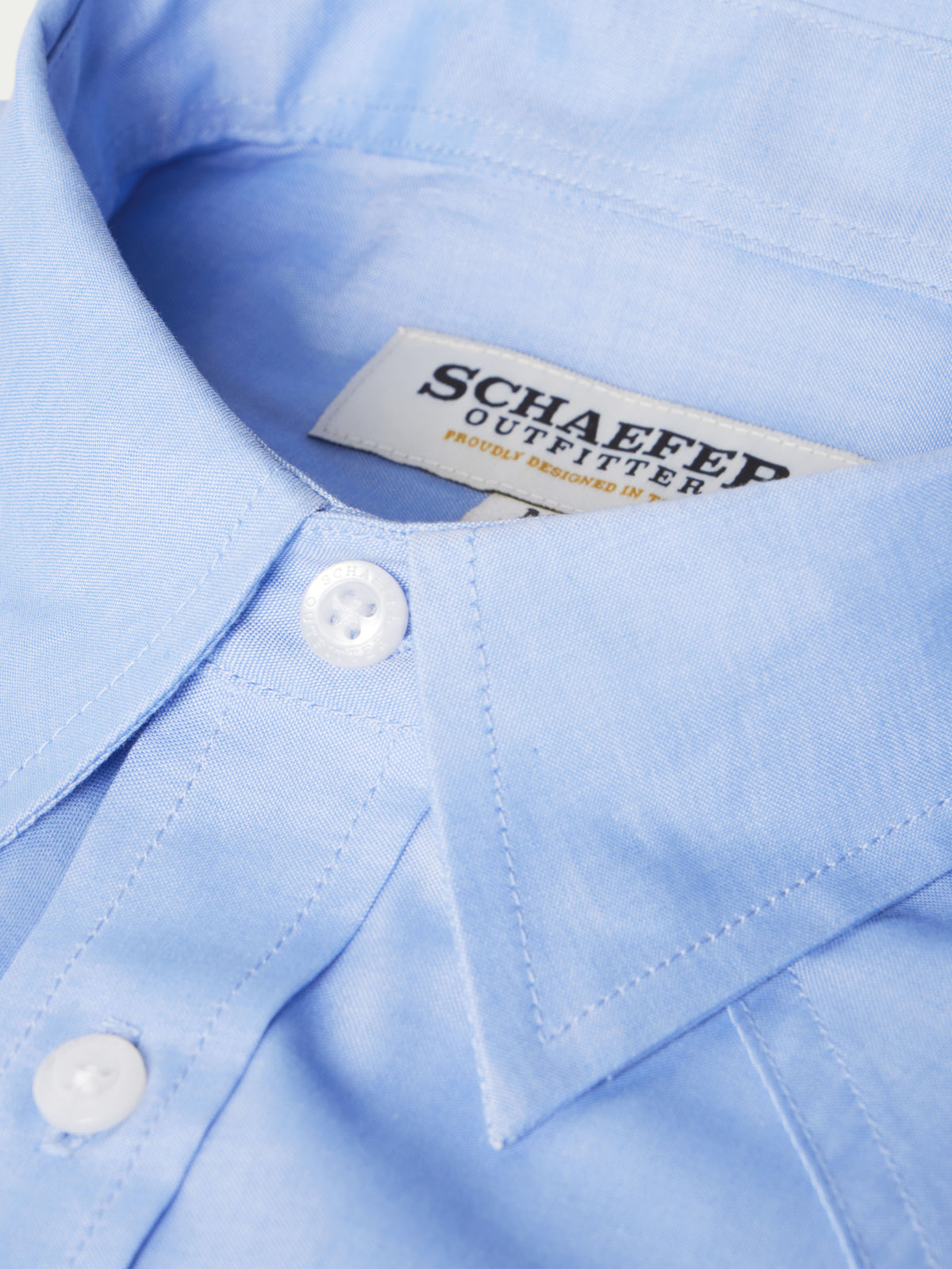 Light blue western button-down shirt with inner neck label and white button