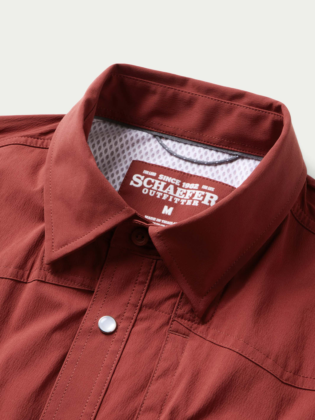 Oxblood western snap shirt with snap placket and branded neck label