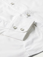 White western snap shirt cuffs with metal snap buttons and side seam detail close-up