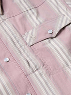 Pink striped shirt yoke and snap buttons with decorative trim