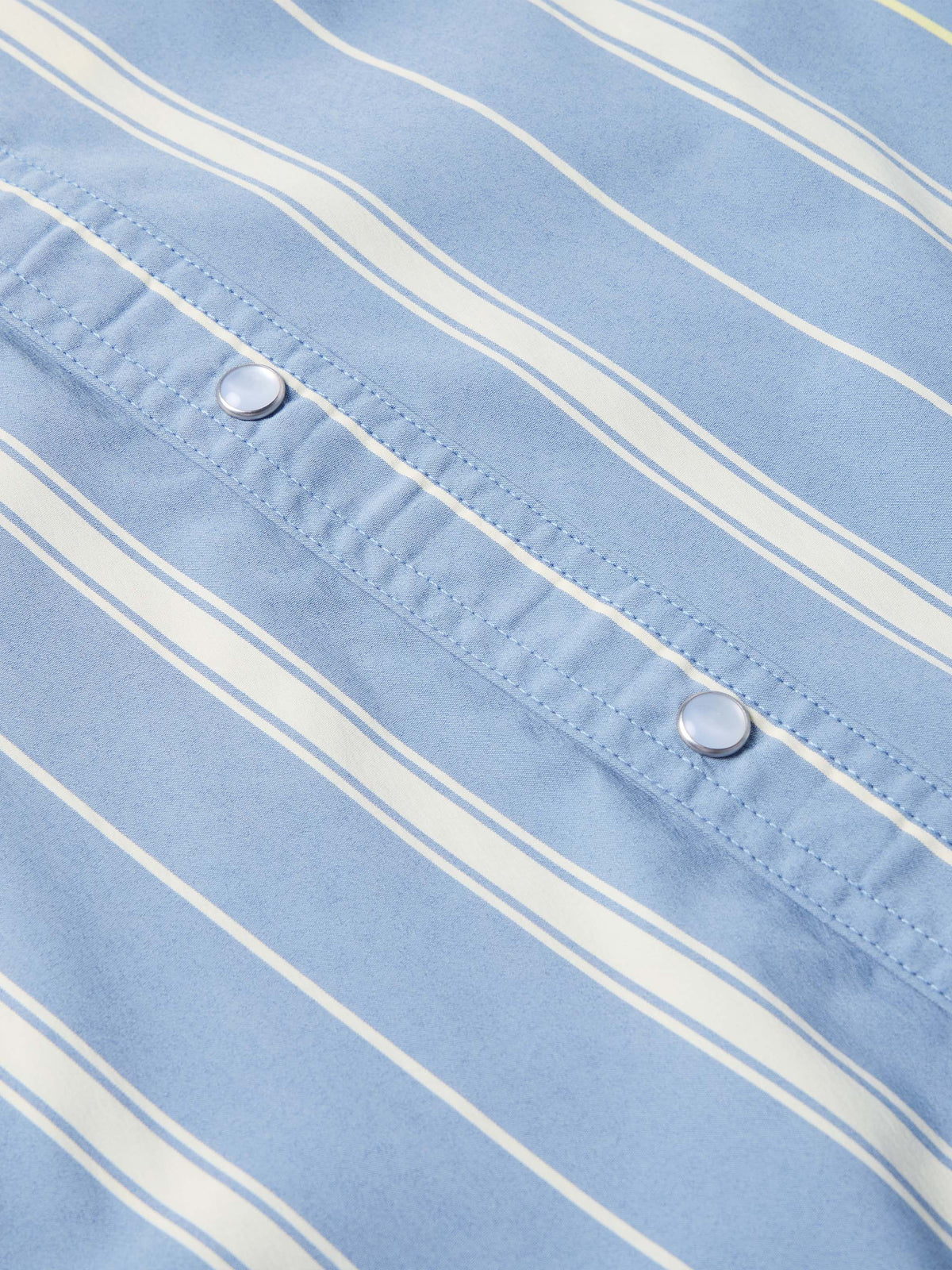Light blue striped snap front shirt with two chest snap buttons