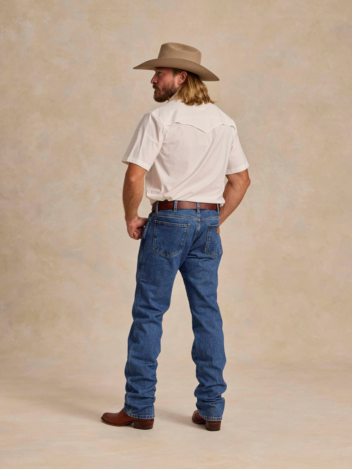 White short-sleeve snap western guide shirt, side view with plain back and short sleeves