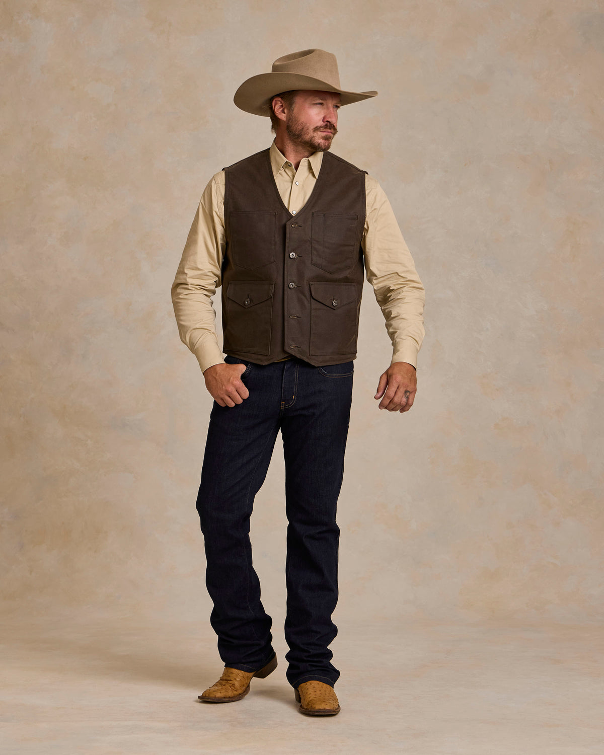 RangeWax® Mesquite vest in dark brown with button front and chest pockets
