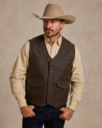Men's dark brown utility vest with flap pockets and button-up front