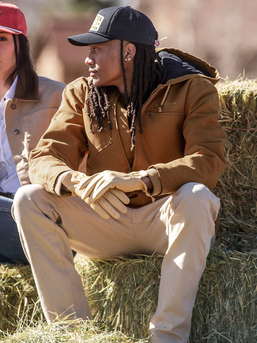 Russet hooded canvas zip jacket with multiple pockets and drawstring hood