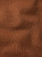 Russet canvas fabric texture close-up, showing fine woven pattern