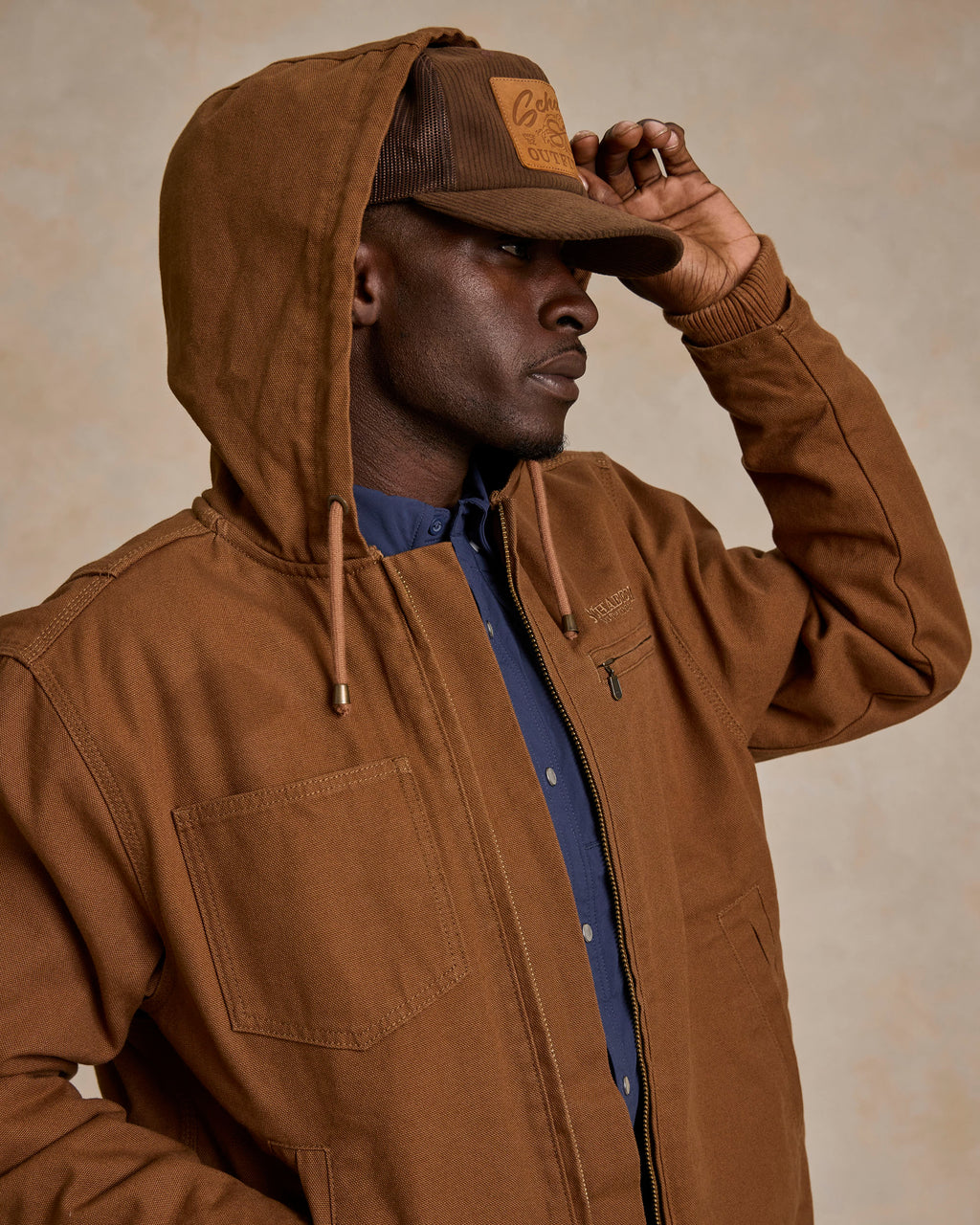 Men's russet hooded zip canvas jacket, close-up of hood drawstrings and front zip