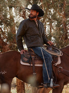 RangeWax Blacktail quilted jacket in dark color, zip front, stand collar, chest pockets.