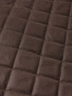 Dark brown quilted diamond pattern fabric