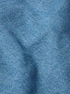 Medium indigo denim fabric close-up texture