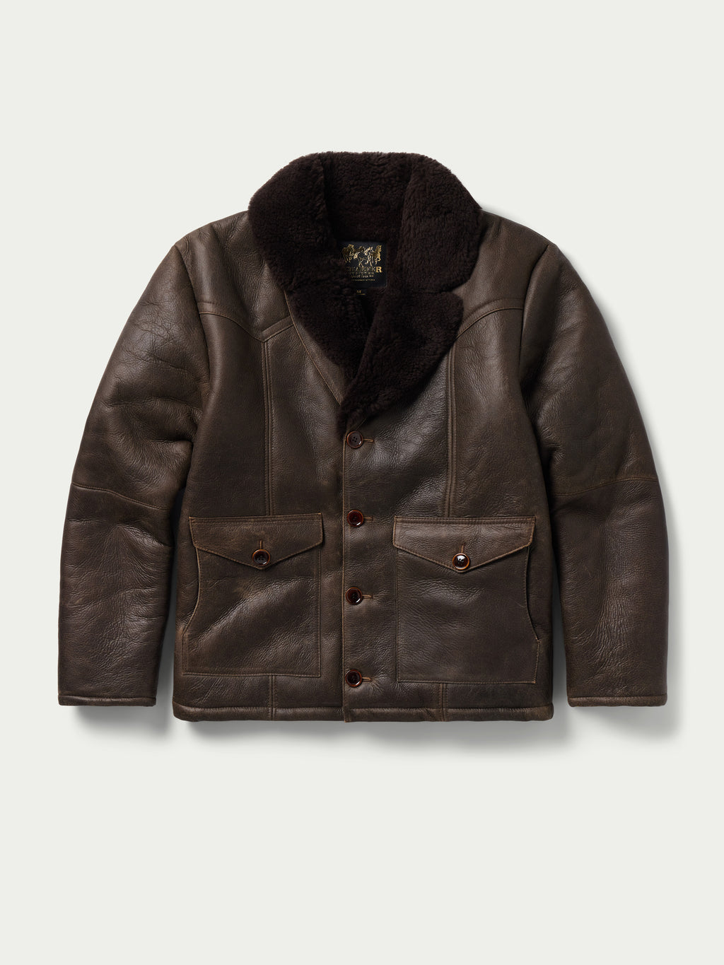 Dark brown shearling leather coat with button front and two chest pockets