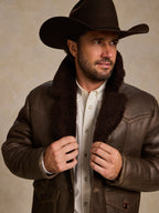 Men's dark brown leather shearling coat with shearling collar and button placket