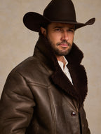 Men's dark brown shearling coat with shearling collar and buttoned front