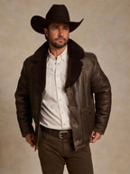 Men's dark brown shearling coat with thick fur collar and front snap pockets