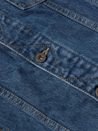 Blue denim jacket front with metal button and contrast stitch seams