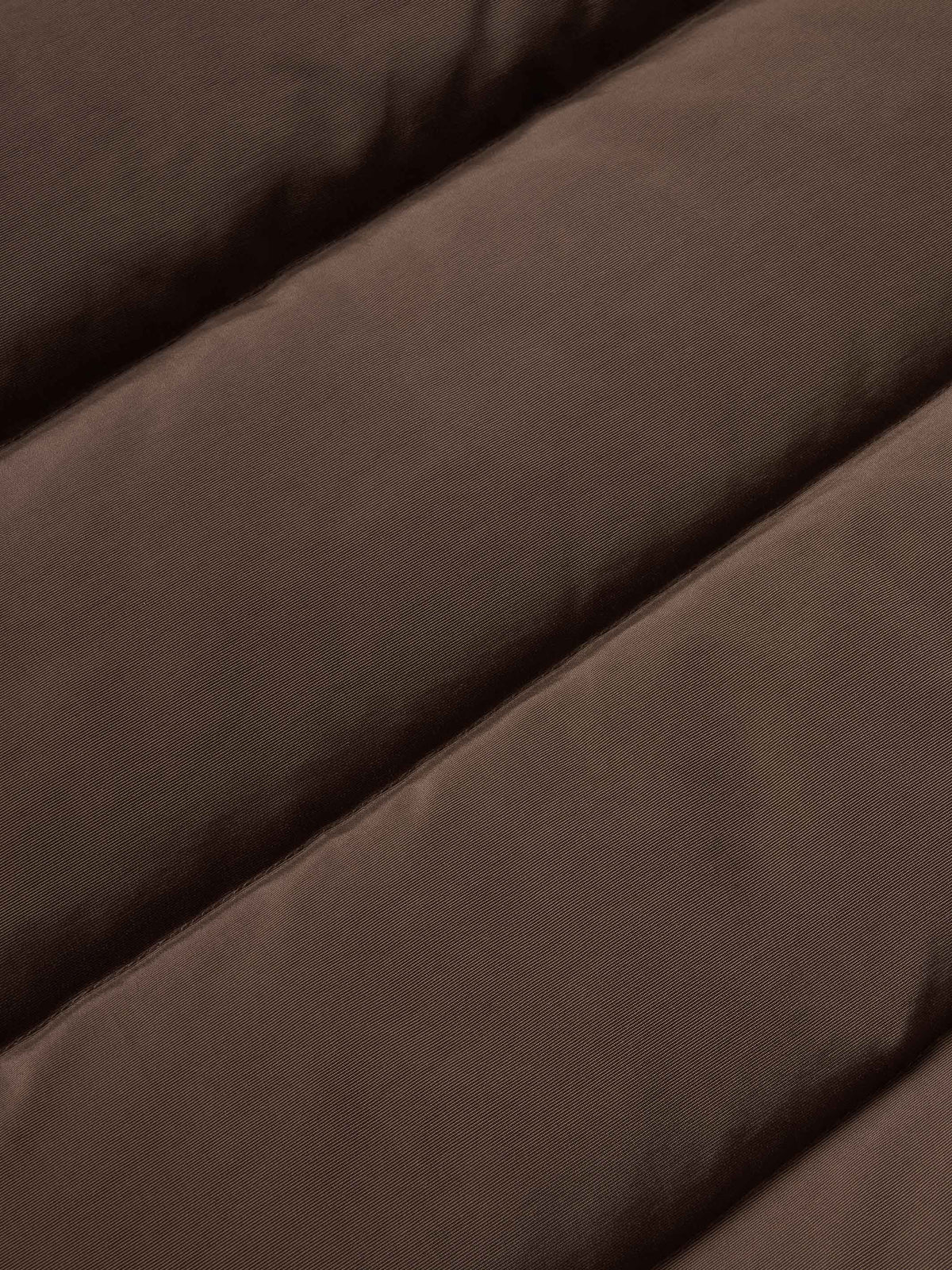 Bozeman down vest close-up of brown padded interior fabric