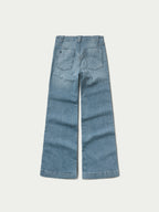 Medium wash denim jeans, straight wide-leg silhouette, back view with pockets