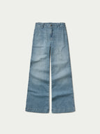 Medium wash denim jeans, straight wide-leg silhouette, front view
