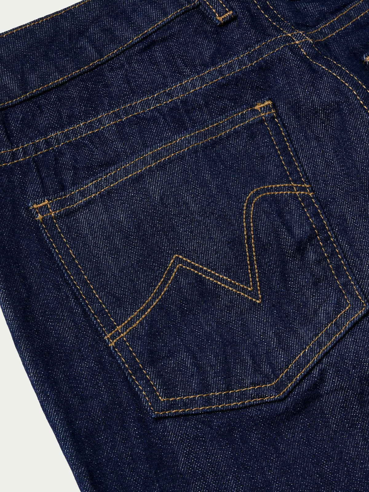 Catherine Jean dark denim jeans with contrast-stitched western pockets and belt loops