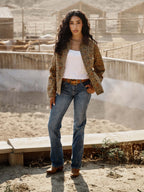 Medium-wash denim jeans with straight legs and belt loops.