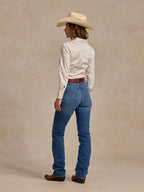 Women’s white button-up shirt viewed from back with long sleeves and collar seam