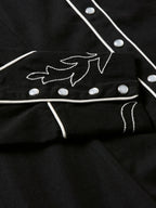 Women's embroidered Dale shirt detail showing white vine embroidery and silver-tone snaps