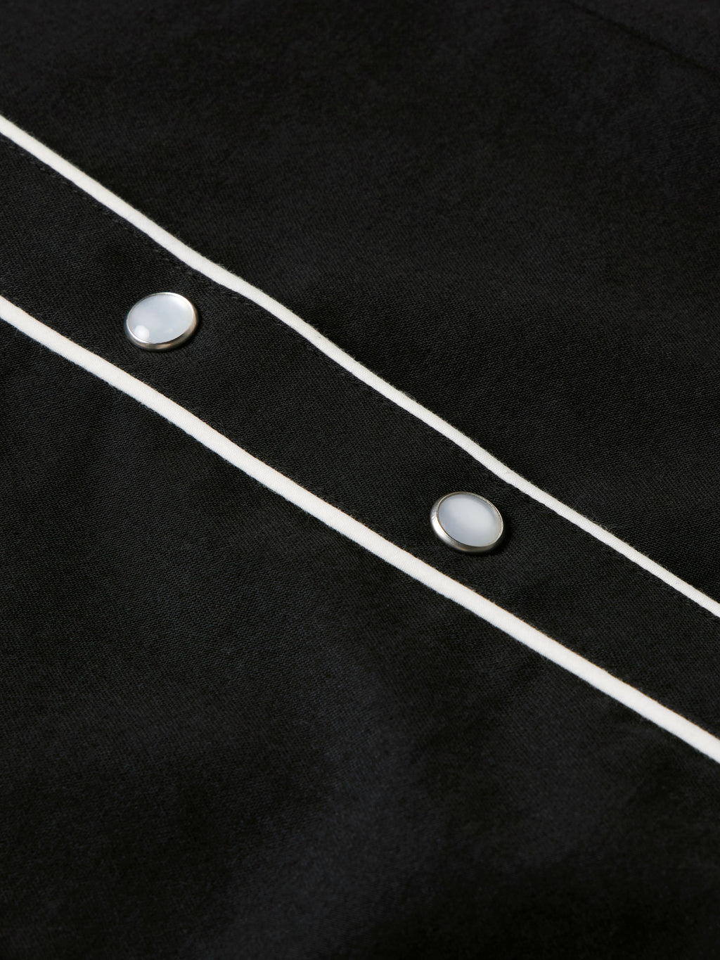 Women's embroidered Dale shirt detail of white trim and silver-tone snap buttons