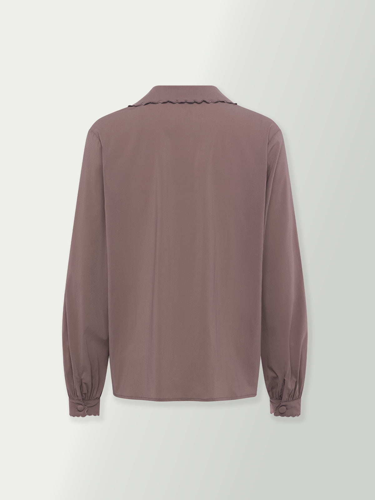 Back view of washed plum button blouse with long sleeves and gathered cuffs