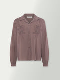 Washed plum blouse front with stand collar and lace-like embroidery on the chest