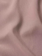 Washed plum blouse fabric texture in a smooth, woven finish