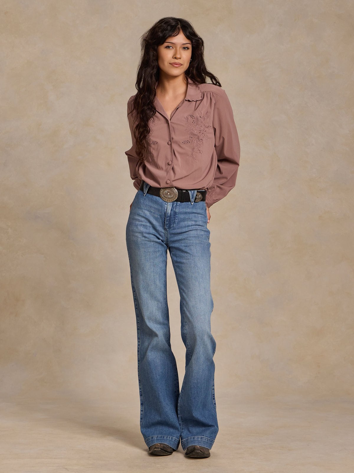 Washed plum button-front blouse with embroidered detail and long puff sleeves